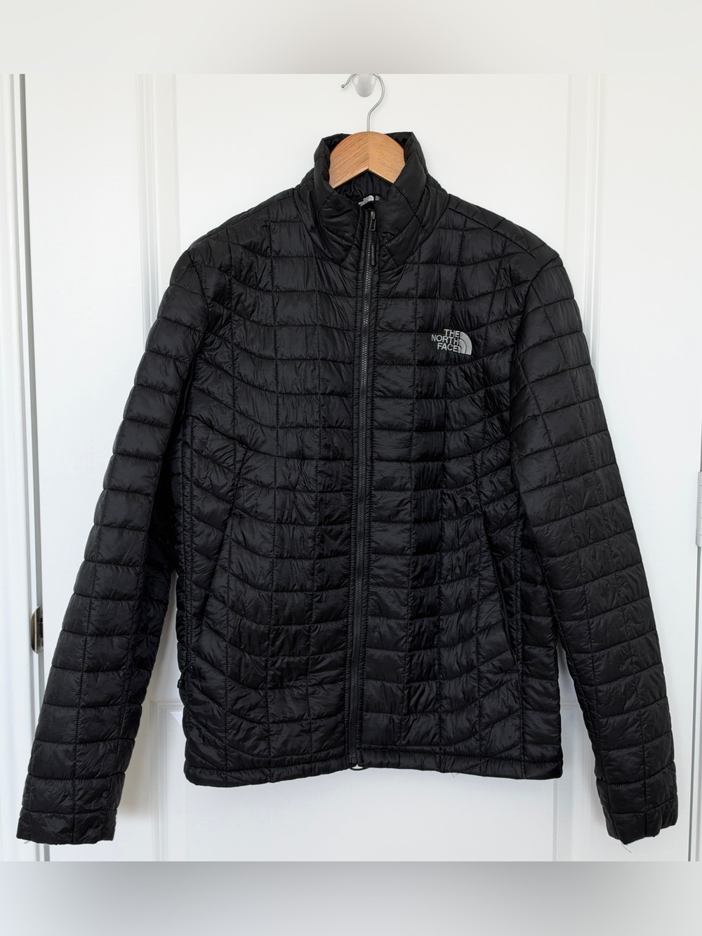 The North Face Thermoball Trekker jacket (w/ TikTok logo)